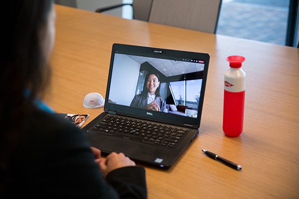 employee engages in an online meeting
